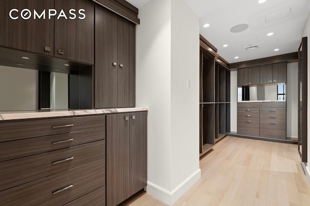 100 Barclay St Unit 21Ad, New York City, NY 10007 - walk in closet featuring light wood-type flooring