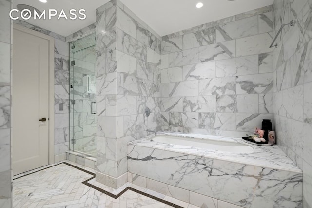 100 Barclay St Unit 21Ad, New York City, NY 10007 - bathroom with a marble finish shower, a garden tub, tile walls, and recessed lighting