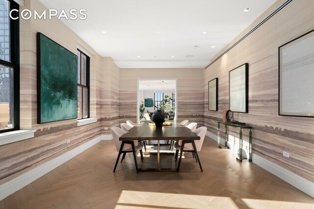 100 Barclay St Unit 21Ad, New York City, NY 10007 - dining space featuring baseboards, wooden walls, healthy amount of natural light, recessed lighting, and wallpapered walls