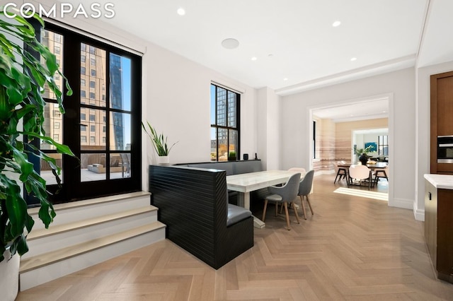 dining room featuring light parquet floors