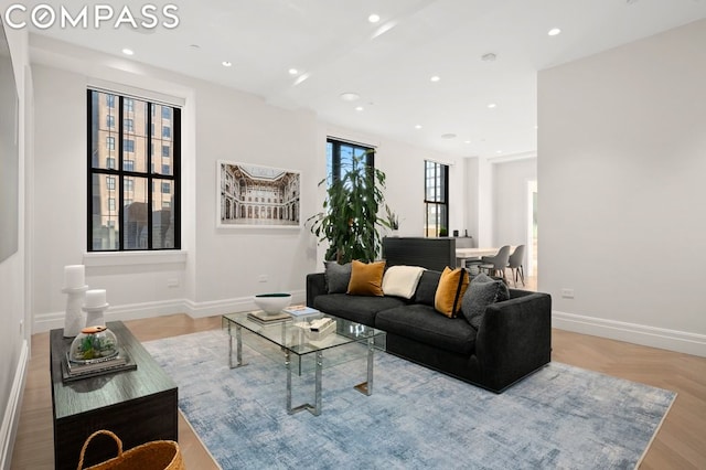 living room with light parquet floors