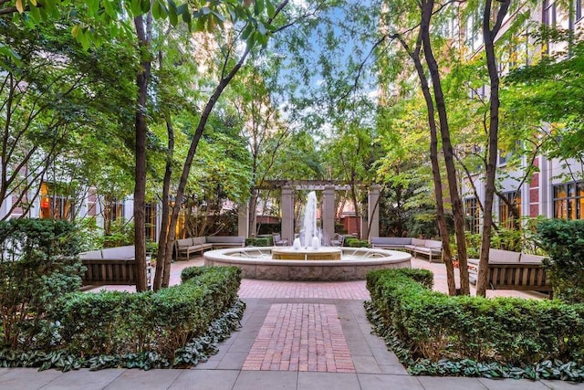 view of property's community with outdoor lounge area