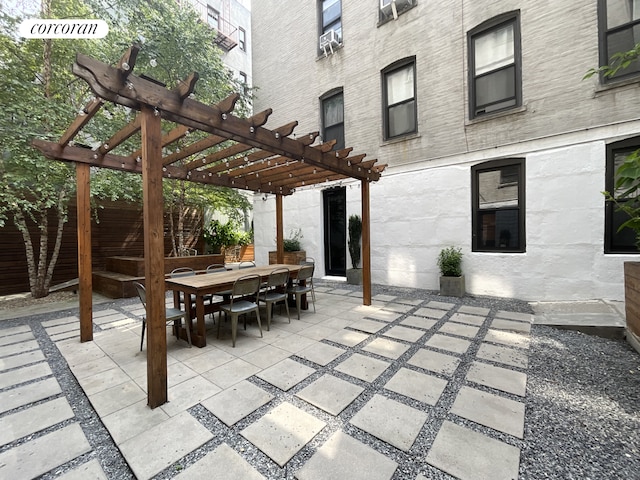 view of patio / terrace featuring a pergola, outdoor dining area, and fence