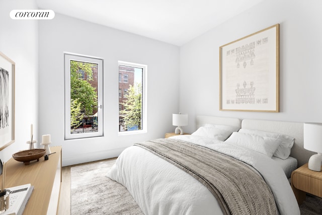 bedroom featuring wood-type flooring