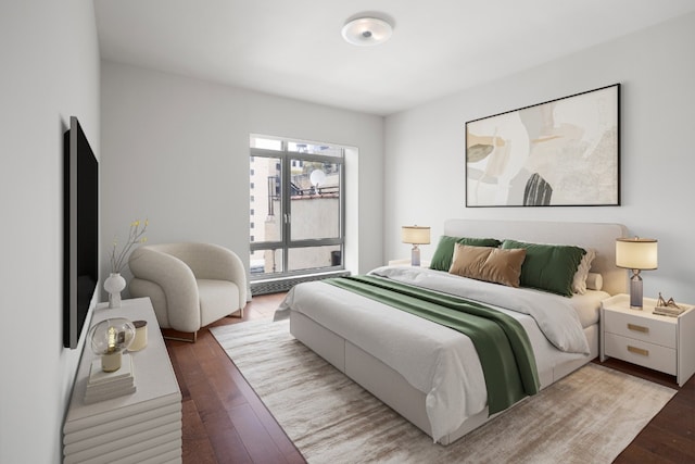 bedroom featuring wood-type flooring