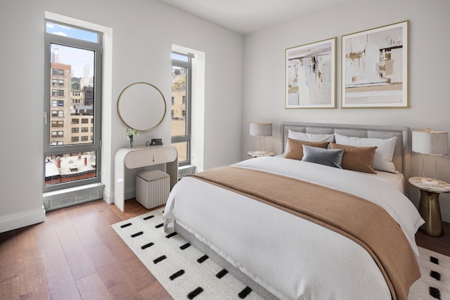 bedroom with wood-type flooring