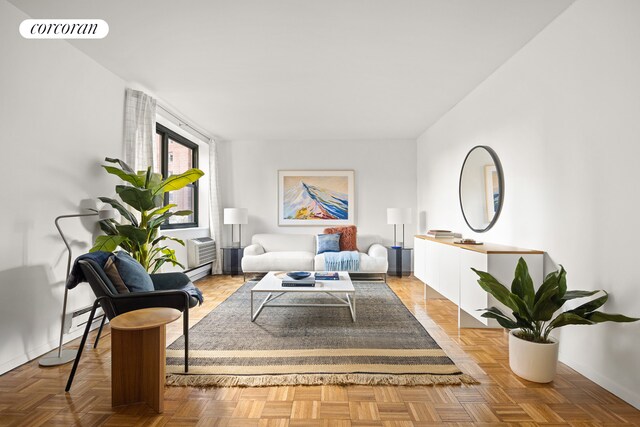 sitting room featuring light parquet flooring