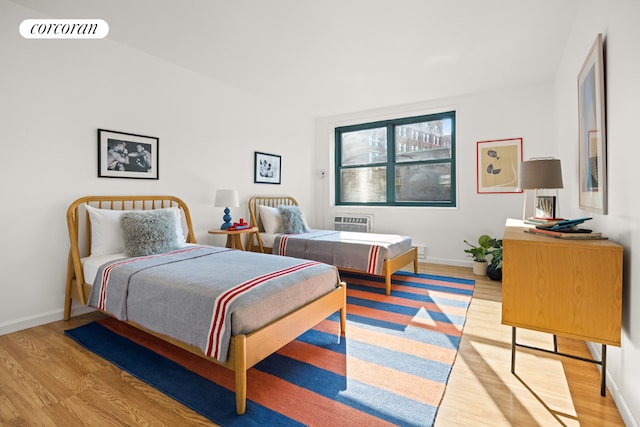 bedroom with light wood-type flooring