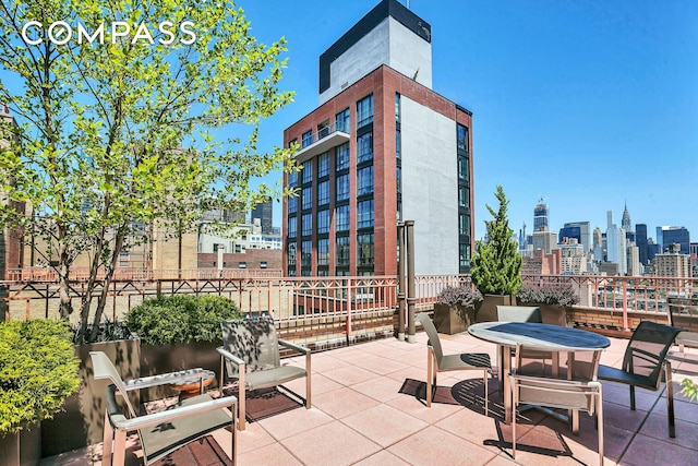 view of patio featuring a city view