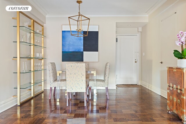 unfurnished dining area with an inviting chandelier, ornamental molding, and dark parquet floors