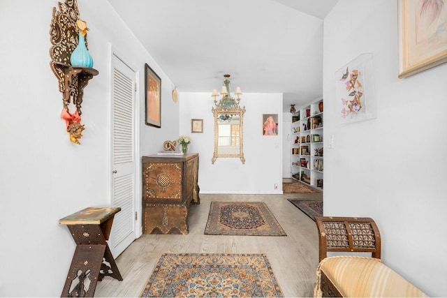 hall with light hardwood / wood-style floors