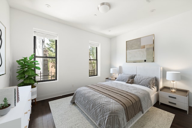 bedroom featuring dark wood-type flooring