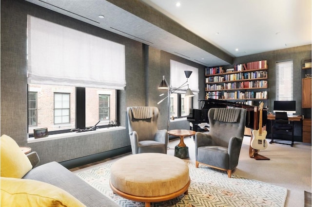 dining space with dark wood-type flooring, a raised ceiling, and sink