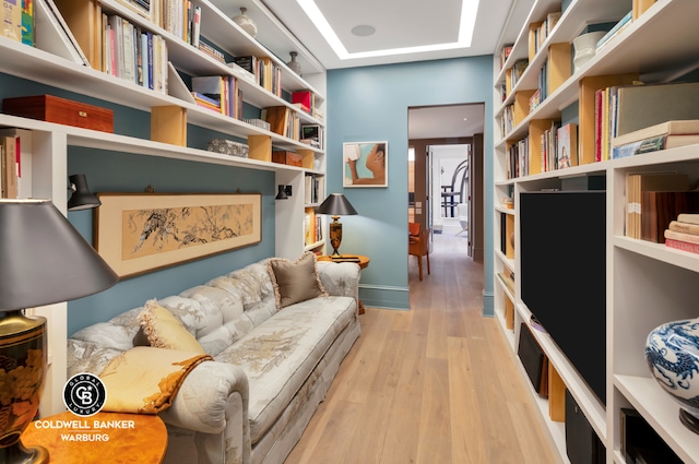 sitting room featuring light hardwood / wood-style floors