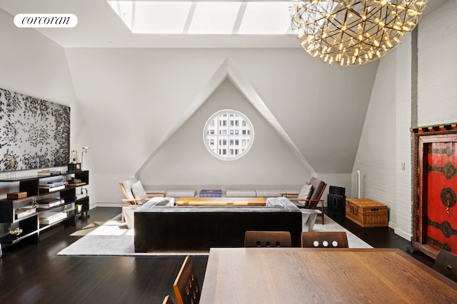 office space featuring visible vents, wood finished floors, and vaulted ceiling