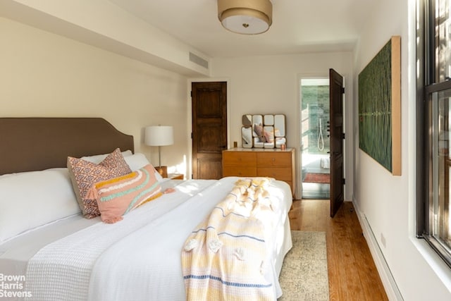 bedroom featuring hardwood / wood-style floors