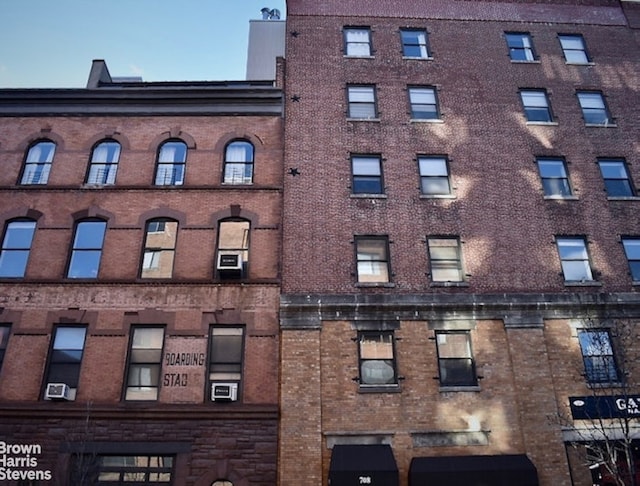 view of building exterior featuring cooling unit