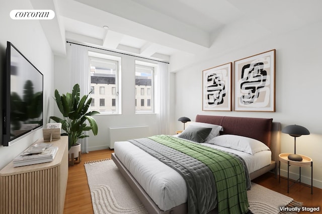 225 Lafayette St Unit 5B, New York City, NY 10012 - bedroom featuring wood finished floors and baseboards