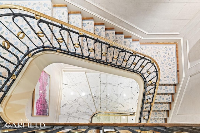 stairs with crown molding