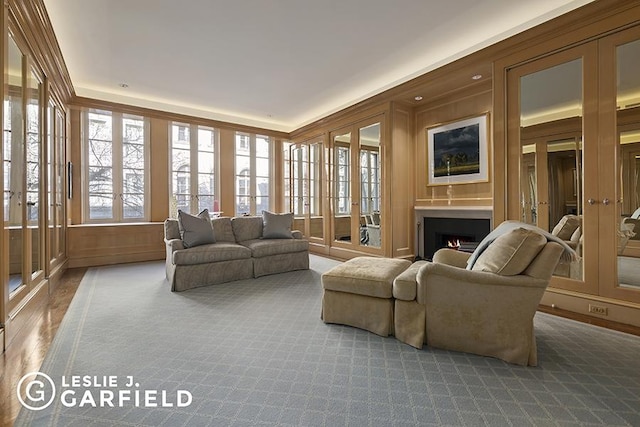 sunroom / solarium featuring french doors