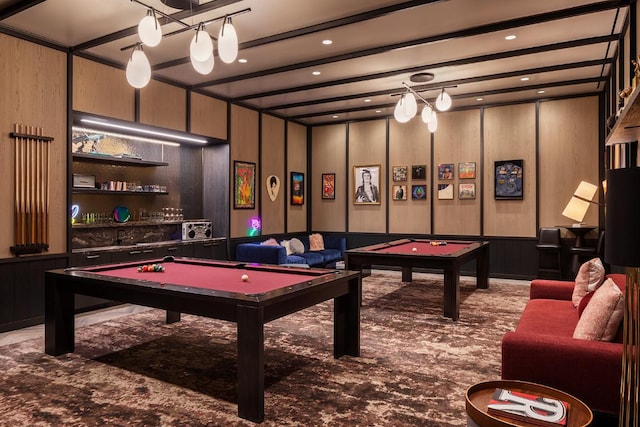 recreation room featuring carpet, pool table, wooden walls, and built in shelves