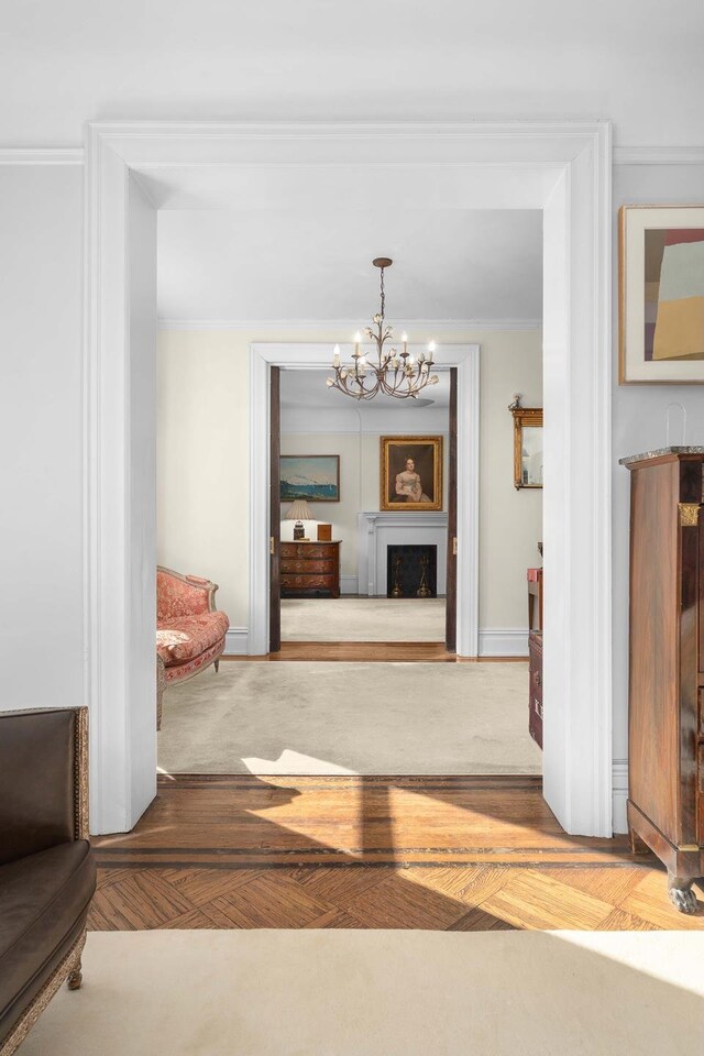 bedroom featuring light hardwood / wood-style flooring and a notable chandelier