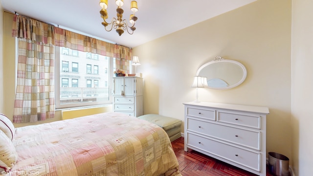 bedroom featuring an inviting chandelier