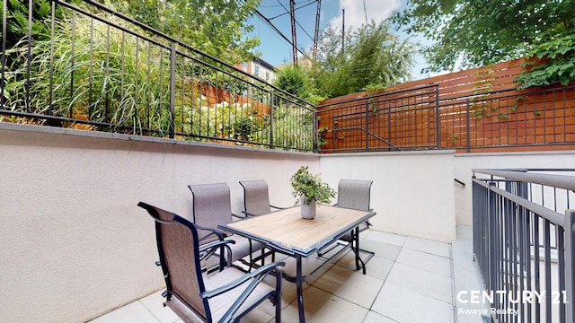 view of patio with outdoor dining space