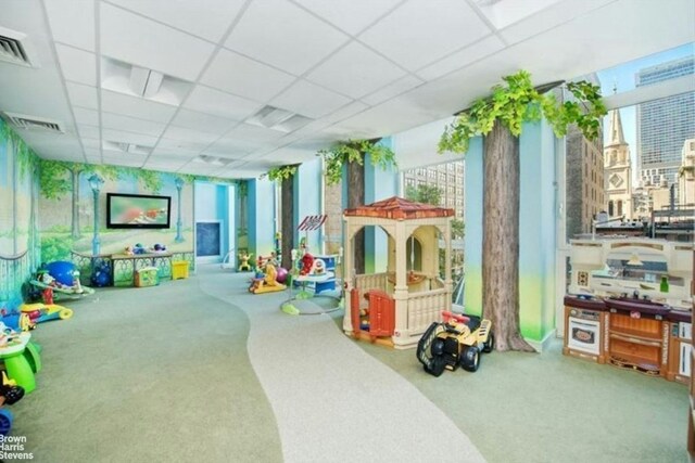 corridor featuring light hardwood / wood-style floors