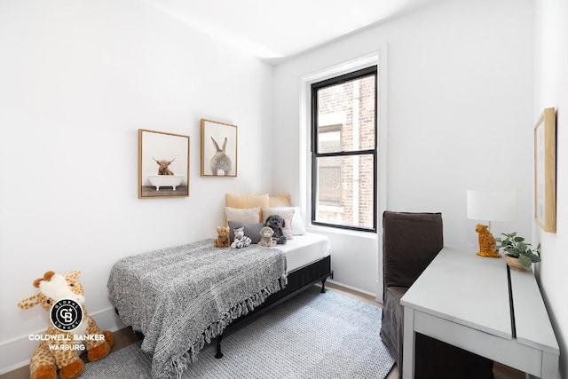 bedroom featuring multiple windows