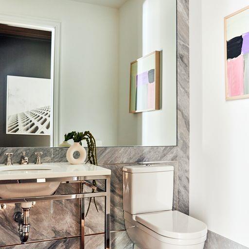 bathroom featuring sink and toilet