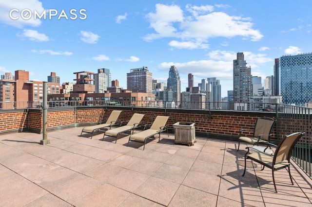 view of patio / terrace with a view of city