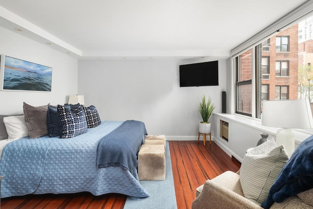 bedroom featuring dark hardwood / wood-style flooring