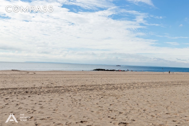 property view of water featuring a view of the beach