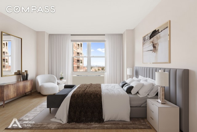 bedroom featuring light wood-type flooring