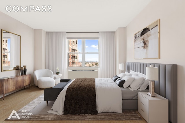 bedroom with light wood-style flooring