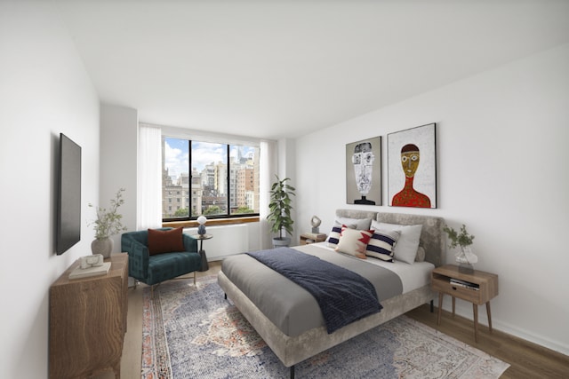 bedroom with wood-type flooring