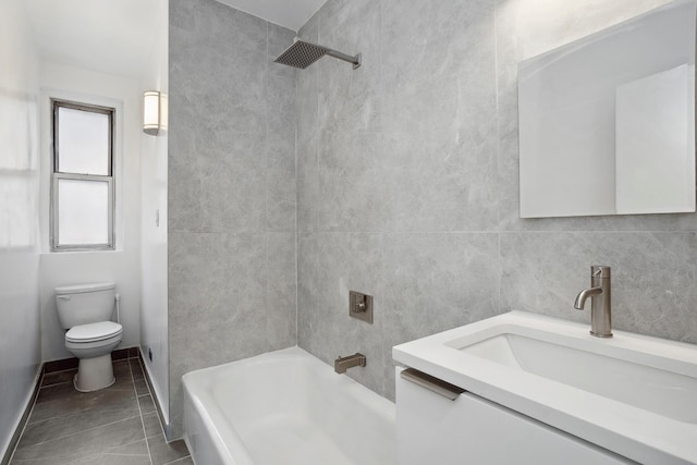 bathroom featuring vanity, shower / tub combination, tile patterned flooring, tile walls, and toilet