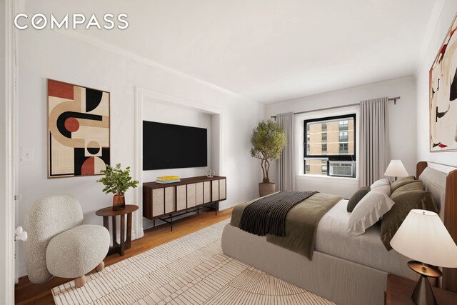 bedroom featuring hardwood / wood-style floors