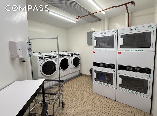 community laundry room featuring stacked washer / dryer and independent washer and dryer