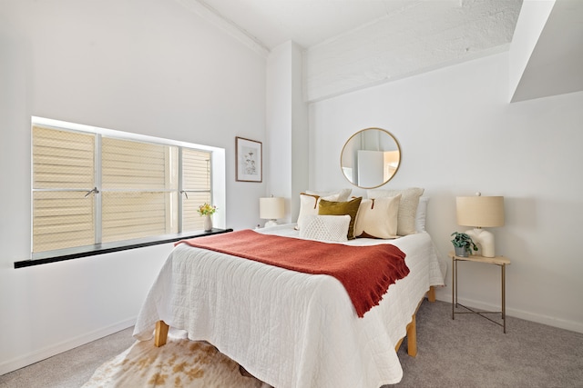 carpeted bedroom with baseboards