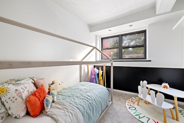 bedroom featuring light colored carpet