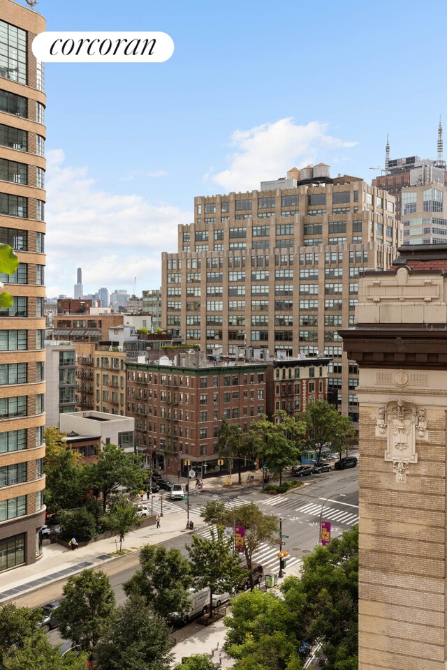 view of building exterior featuring a city view