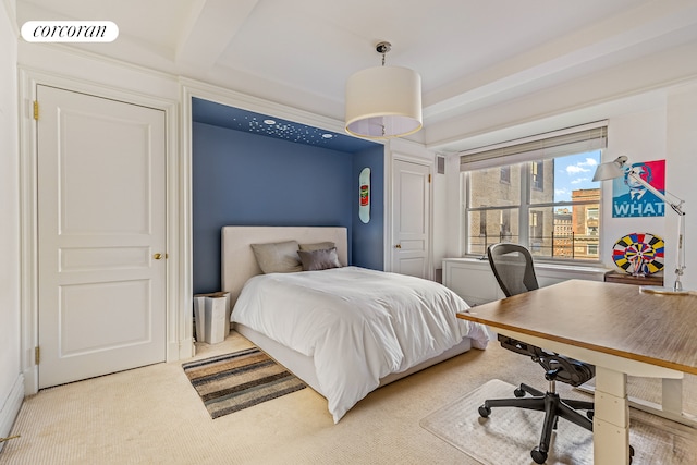 bedroom with beam ceiling, carpet flooring, and visible vents