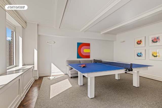 playroom with ornamental molding and beamed ceiling