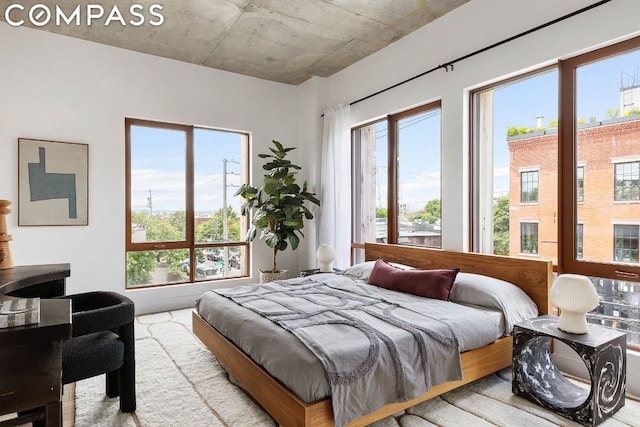 bedroom featuring multiple windows