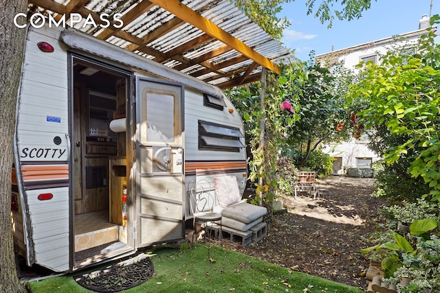 exterior space with a pergola