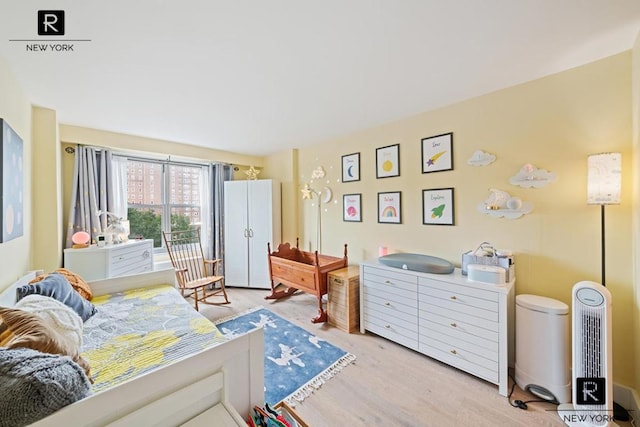 bedroom featuring light hardwood / wood-style floors