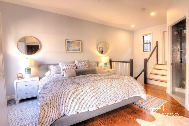 bedroom featuring recessed lighting and wood finished floors