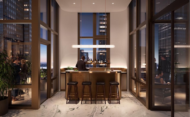 bar featuring marble finish floor, a wall of windows, and bar area